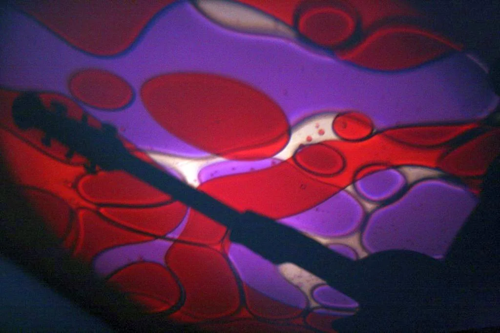 Psychedelic liquid light projection made with coloured oils