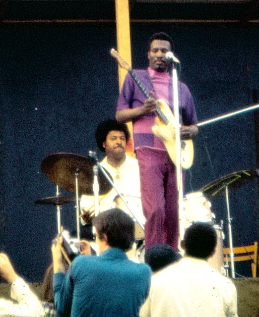 Magic Sam performing with guitar at the 1969 Ann Arbor Blues Festival. Sam Lay on drums. Ann Arbor, Michigan, August 1969. Photo by Jeff Titon.
