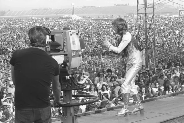 Ozzy Osbourne of Black Sabbath performing before the California Jam crowd in 1974