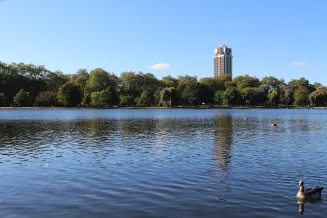 Visitors crossing Hyde Park in London