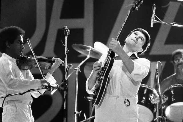 L. Shankar and John McLaughlin performing with One Truth Band at Jazz Bilzen in 1978